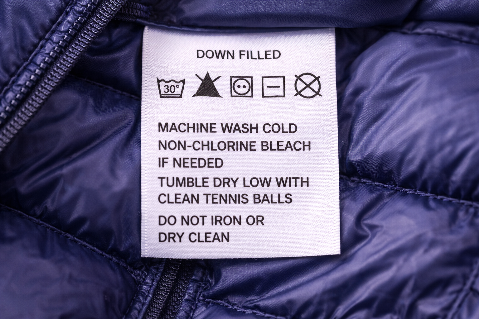 Clothing Care Label On Blue Jacket
