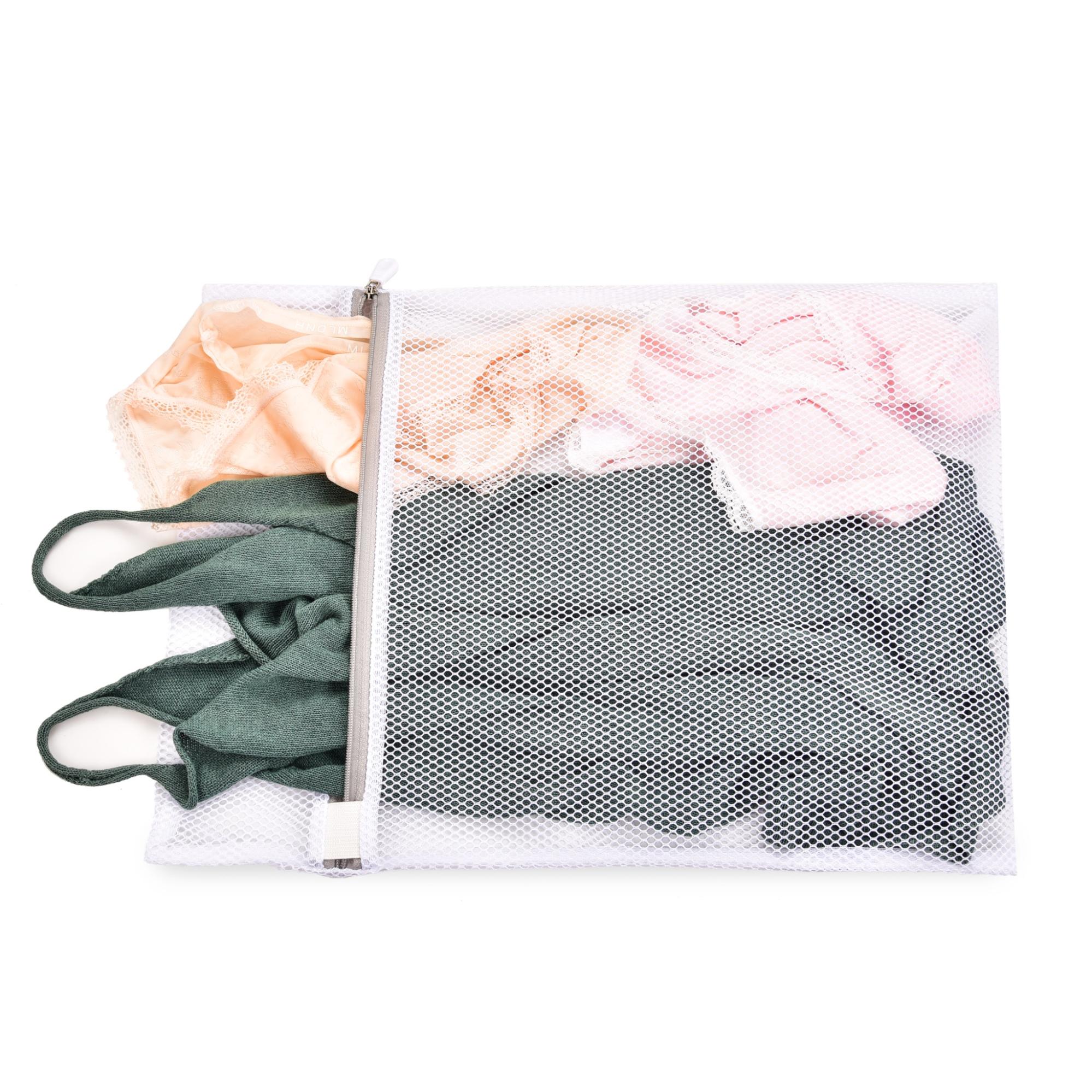 Mesh bag containing assorted clothes