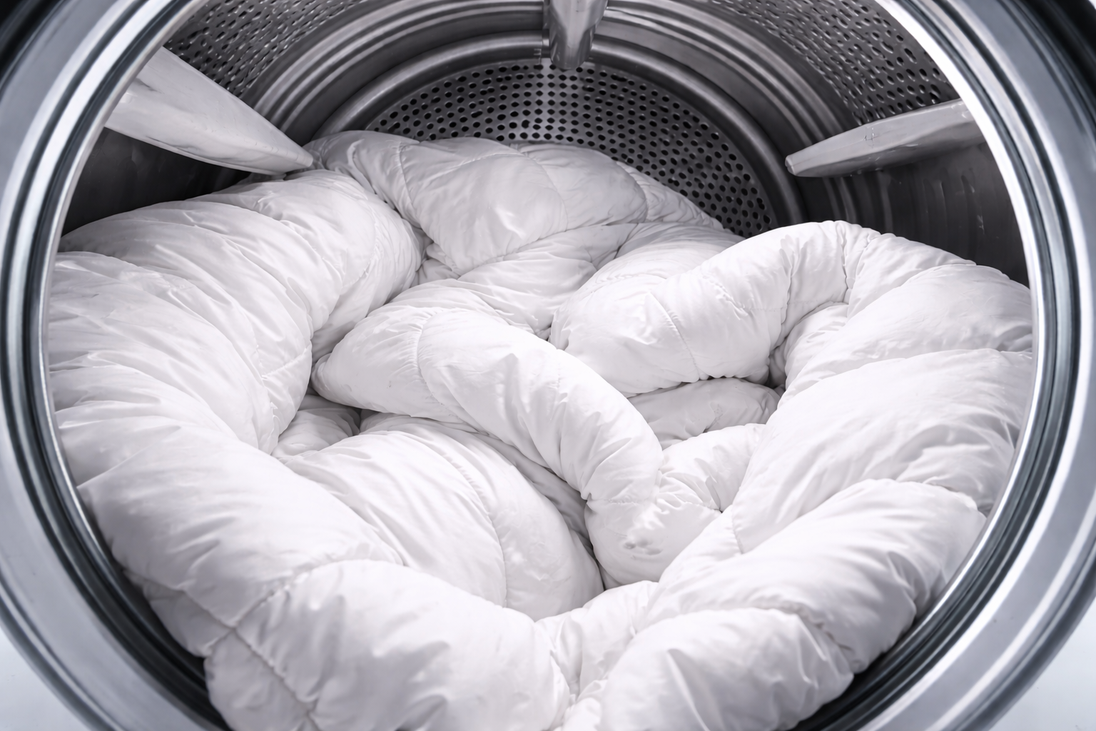 White comforter in a washing machine
